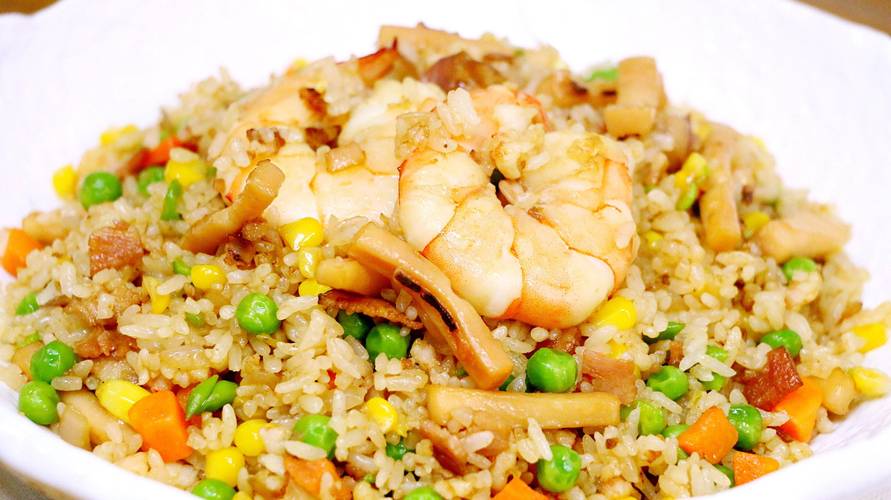 炒米海鲜泡饭如何做出锅巴香鲜？-图1