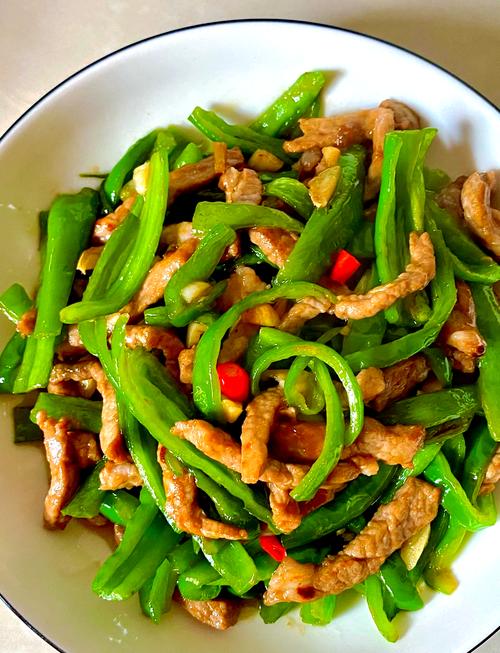 辣椒炒肉丝如何炒得嫩滑入味?-图1 辣椒炒肉丝如何炒得嫩滑入味?-图1