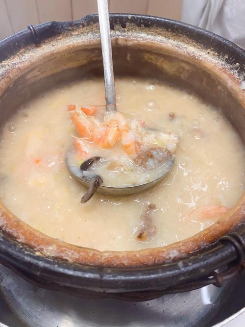 广州潮汕海鲜砂锅粥做法-图1