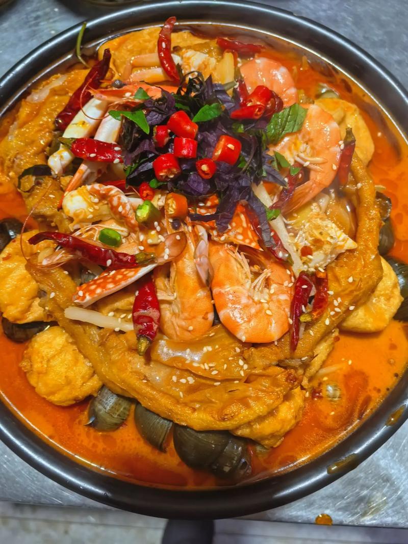 广西田螺海鲜煲的做法-图2