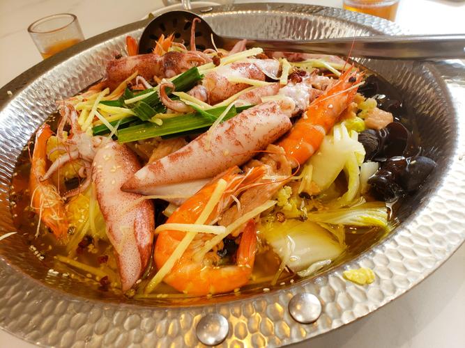 水煮海鲜大杂烩怎么烧才入味？-图3